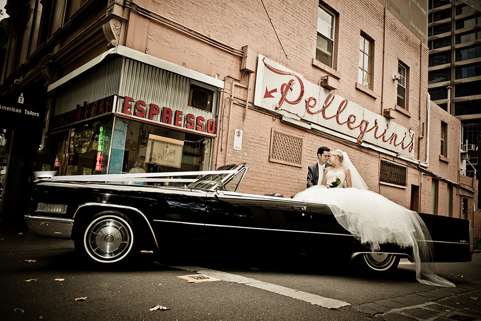 Vintage 1966 classic Cadillac convertible wedding car parked outside Pellegrini's Espresso Bar in Melbourne