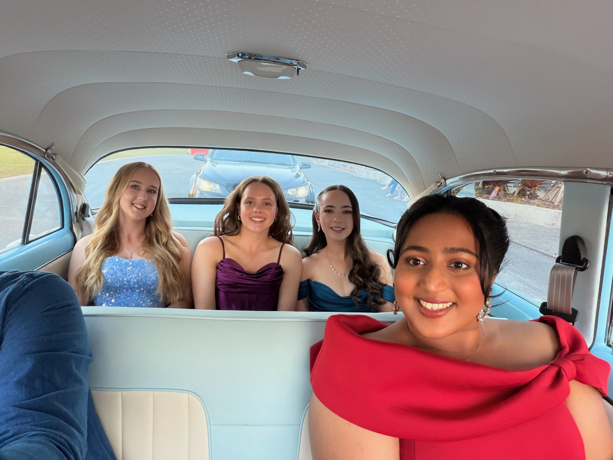 Student in Melbourne having a fun ride to their school formal in a Dream Ride