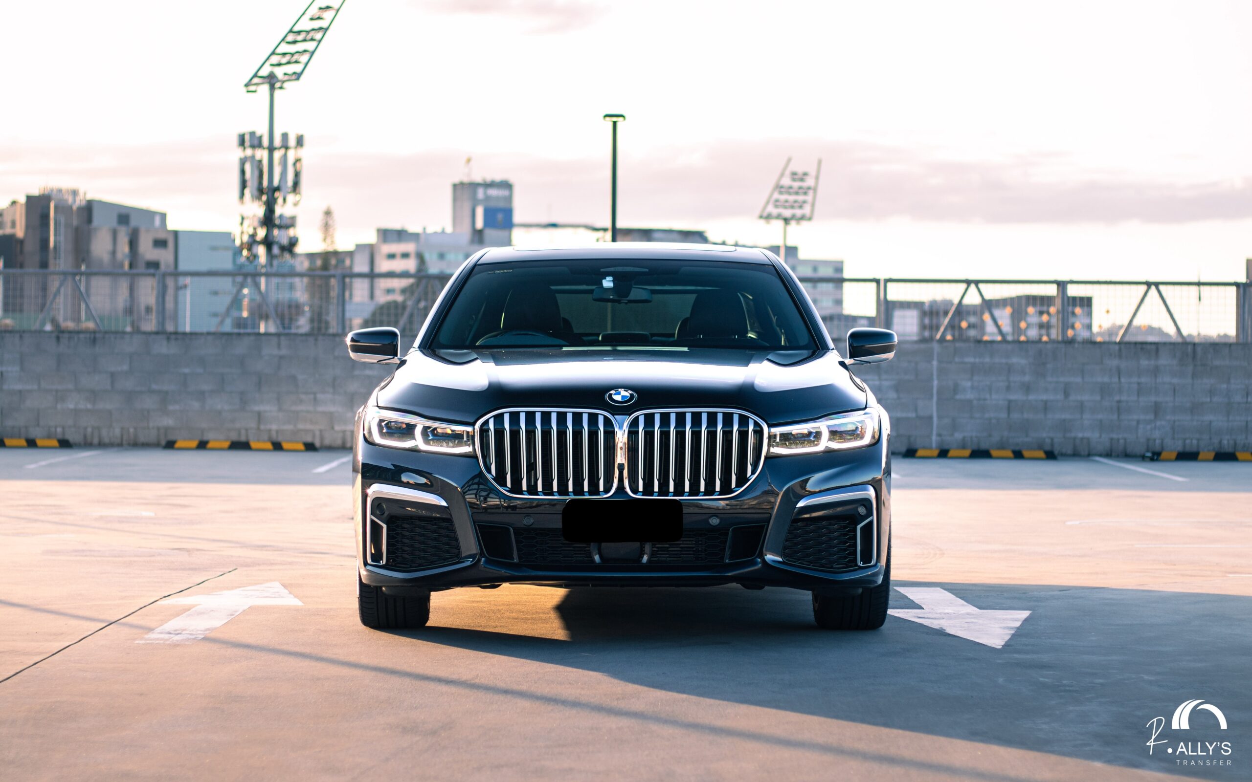 BMW 7 Series luxury sedan parked for Gold Coast school formal transport hire