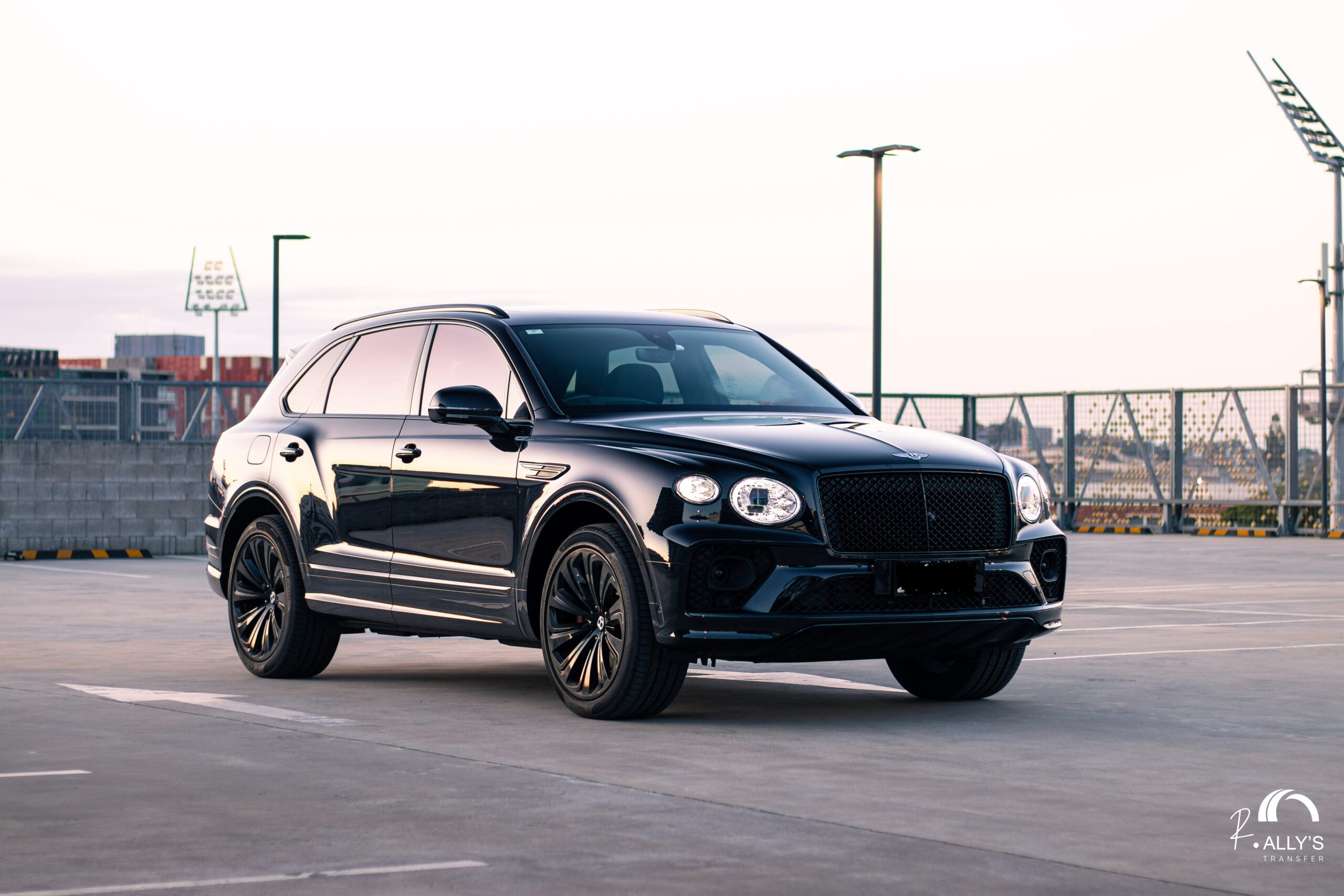 Black Bentley Bentayga luxury SUV parked for Gold Coast school formal transfer hire