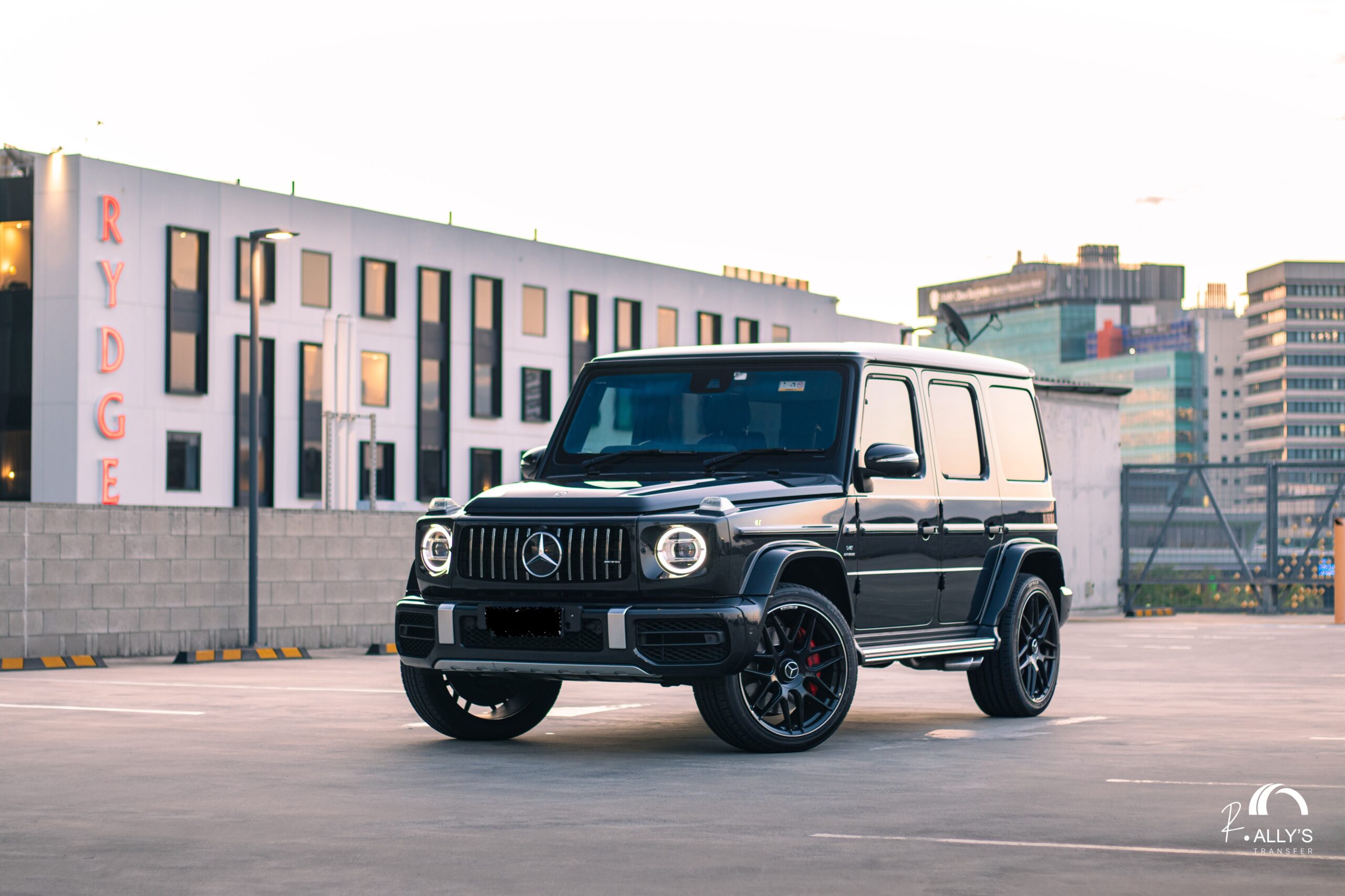 Black Mercedes-Benz G63 AMG luxury SUV parked for Gold Coast school formal transport hire